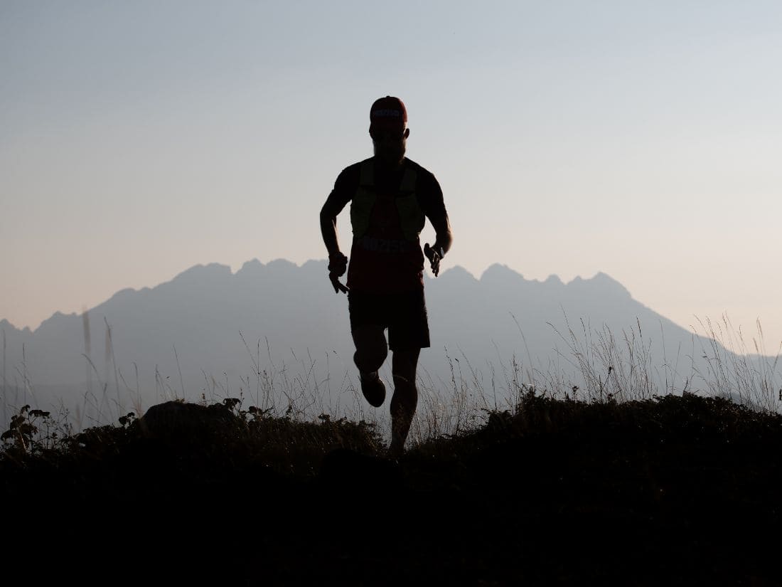 Runner silhouette at sunrise symbolizing the freedom and spirit of running